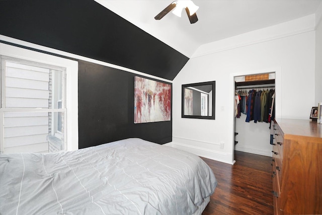 1629 W Foster Ave, Chicago, IL 60640 - bedroom with lofted ceiling, wood finished floors, a closet, a walk in closet, and a ceiling fan