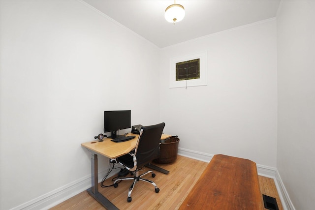 1629 W Foster Ave, Chicago, IL 60640 - home office featuring crown molding and wood finished floors