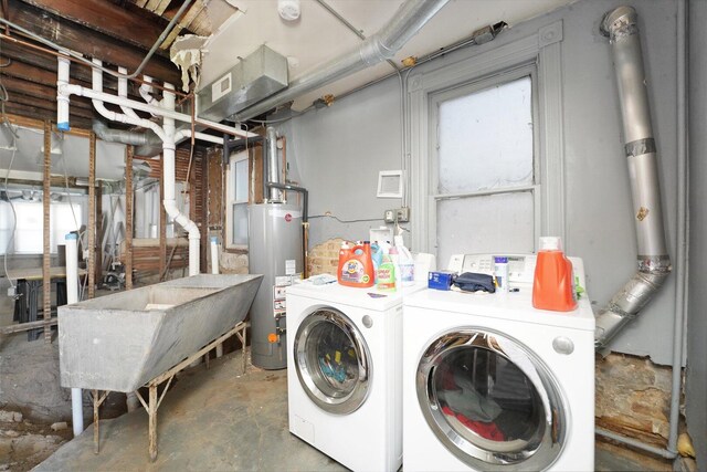 1629 W Foster Ave, Chicago, IL 60640 - laundry room with gas water heater and washer and dryer