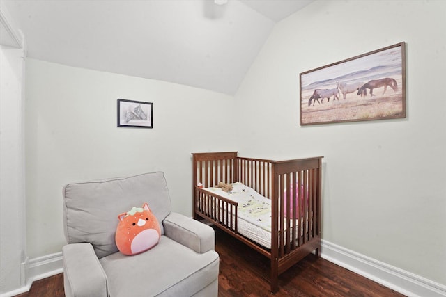 1629 W Foster Ave, Chicago, IL 60640 - bedroom with vaulted ceiling, wood finished floors, and a nursery area