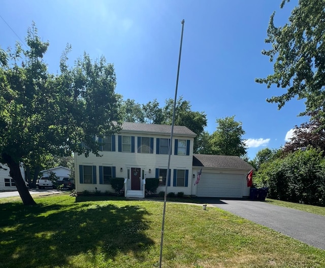 36872 N Lawrence Dr, Lake Villa, IL 60046 - colonial home featuring a garage, driveway, and a front lawn
