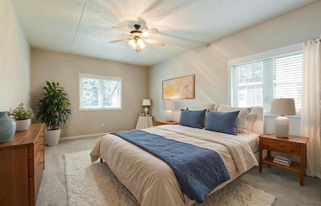 6433 Pine Cone Dr Unit 1, Tinley Park, IL 60477 - bedroom with light colored carpet and ceiling fan