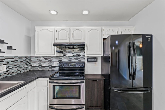 410 N 4th St, Saint Joseph, IL 61873 - kitchen with freestanding refrigerator, stainless steel range with electric cooktop, dark countertops, white cabinets, and tasteful backsplash