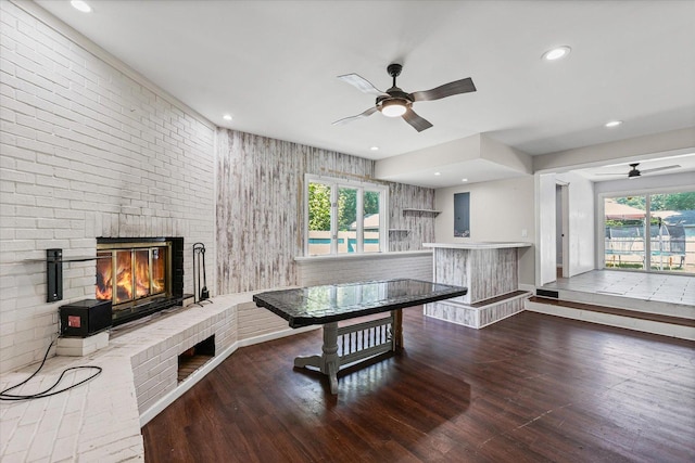410 N 4th St, Saint Joseph, IL 61873 - dining room featuring ceiling fan, a fireplace, healthy amount of natural light, wood finished floors, and recessed lighting