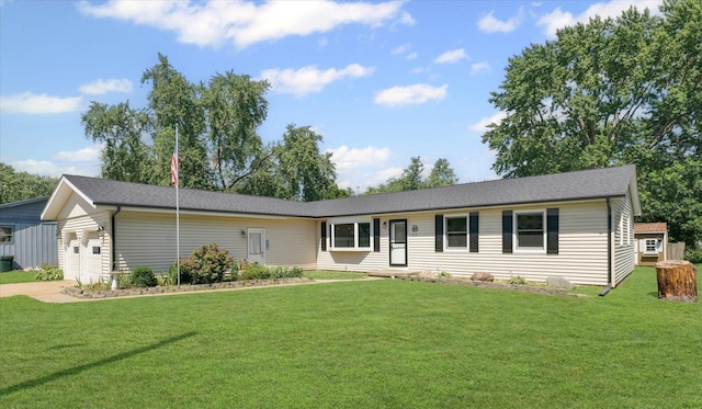410 N 4th St, Saint Joseph, IL 61873 - single story home featuring a garage and a front yard
