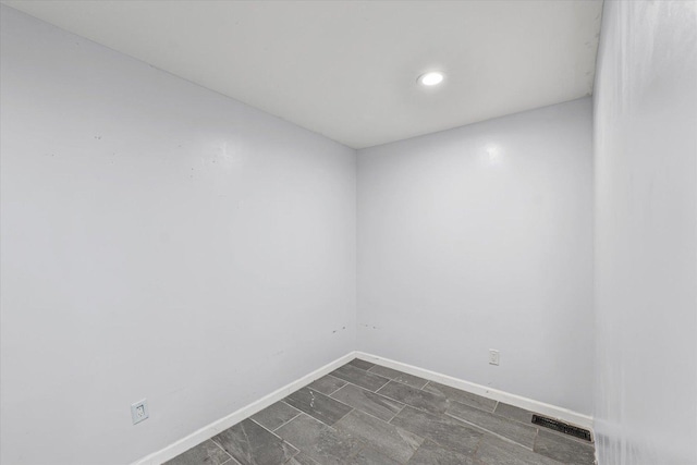 410 N 4th St, Saint Joseph, IL 61873 - empty room with baseboards and recessed lighting