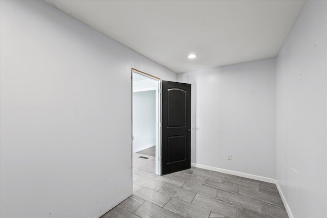 410 N 4th St, Saint Joseph, IL 61873 - empty room with recessed lighting and baseboards