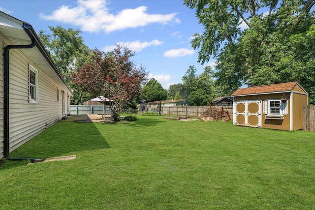 410 N 4th St, Saint Joseph, IL 61873 - fenced backyard with a storage shed