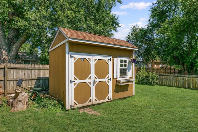 410 N 4th St, Saint Joseph, IL 61873 - view of shed featuring a fenced backyard