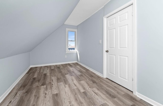 4329 S Wood St, Chicago, IL 60609 - additional living space with wood finished floors and lofted ceiling
