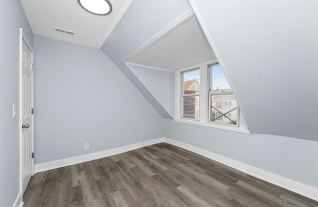 4329 S Wood St, Chicago, IL 60609 - additional living space with lofted ceiling and wood finished floors