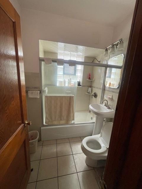 4330 S Talman Ave, Chicago, IL 60632 - bathroom featuring shower / bath combination with glass door and tile patterned flooring