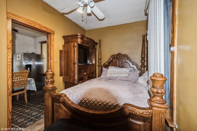 4330 S Talman Ave, Chicago, IL 60632 - bedroom with wood finished floors, stainless steel fridge, and ceiling fan