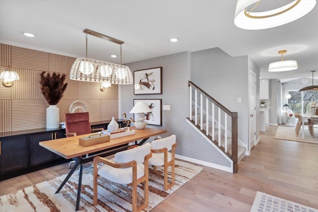 892 Fair Meadow Ct, North Aurora, IL 60542 - dining space with wallpapered walls, an accent wall, stairway, wood finished floors, and recessed lighting