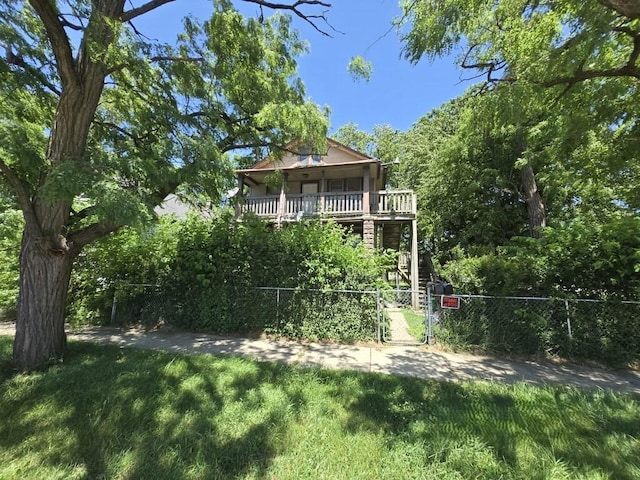 630 Belle Ct, Phoenix, IL 60426 - view of yard featuring a gate and a porch