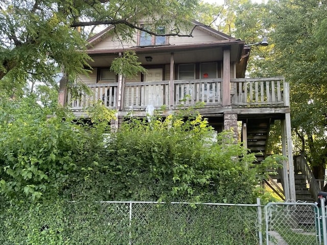 630 Belle Ct, Phoenix, IL 60426 - rear view of house featuring stairway