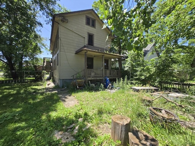 630 Belle Ct, Phoenix, IL 60426 - back of house with a lawn