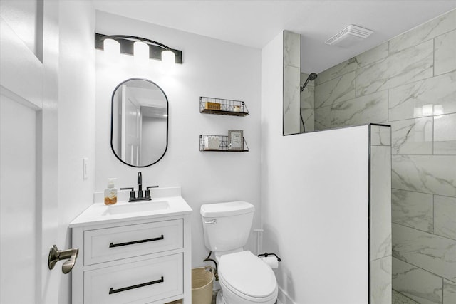 4006 Tallgrass Dr, Champaign, IL 61822 - bathroom featuring vanity and a marble finish shower