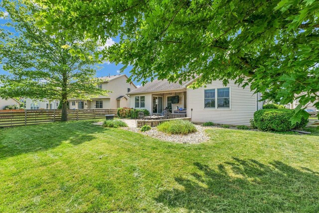 4006 Tallgrass Dr, Champaign, IL 61822 - back of property with a patio area