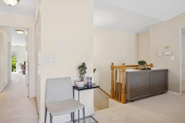 1007 Enfield Dr Unit 1007, Northbrook, IL 60062 - hallway featuring light carpet and an upstairs landing