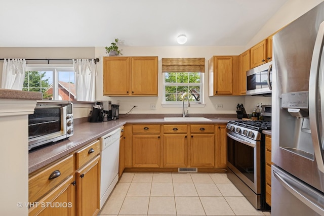1007 Enfield Dr Unit 1007, Northbrook, IL 60062 - kitchen featuring appliances with stainless steel finishes and light tile patterned floors