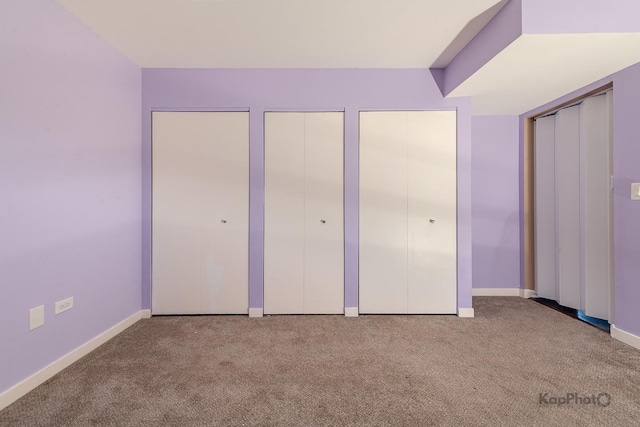 1812 S State St Unit 28, Chicago, IL 60616 - unfurnished bedroom with two closets and carpet flooring