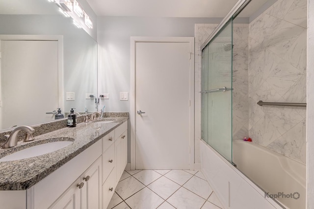 1812 S State St Unit 28, Chicago, IL 60616 - bathroom featuring double vanity, bath / shower combo with glass door, and tile patterned flooring