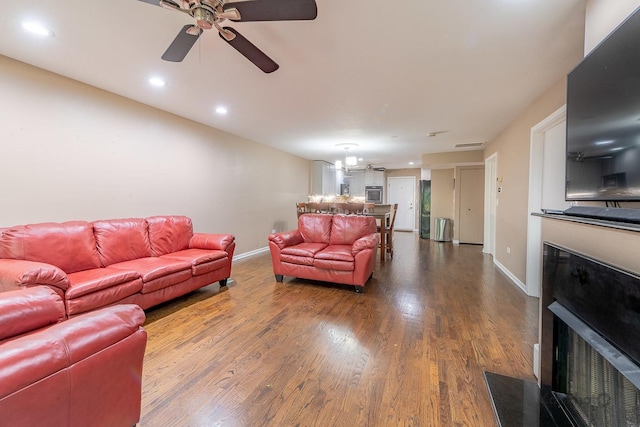 1812 S State St Unit 28, Chicago, IL 60616 - living area featuring ceiling fan, wood finished floors, a fireplace with flush hearth, and recessed lighting