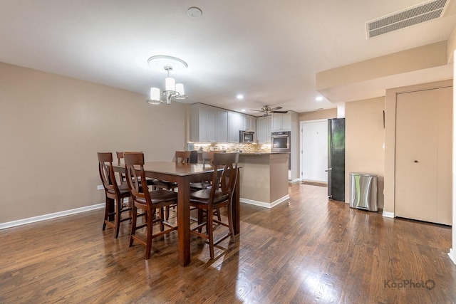 1812 S State St Unit 28, Chicago, IL 60616 - dining area featuring dark wood finished floors, recessed lighting, a ceiling fan, and a chandelier