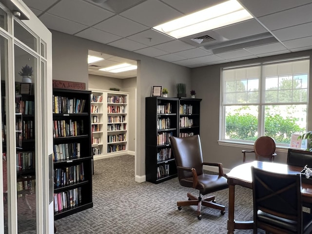 1137 Crestview Ln, Pingree Grove, IL 60140 - office area featuring wall of books, carpet floors, and a drop ceiling