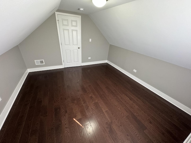 7772 Lawler Ave, Burbank, IL 60459 - bonus room featuring dark wood-type flooring and vaulted ceiling