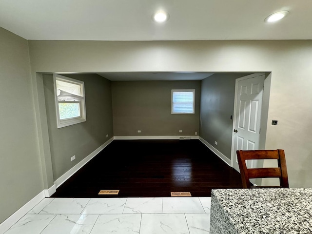 7772 Lawler Ave, Burbank, IL 60459 - below grade area with marble look tile flooring and recessed lighting