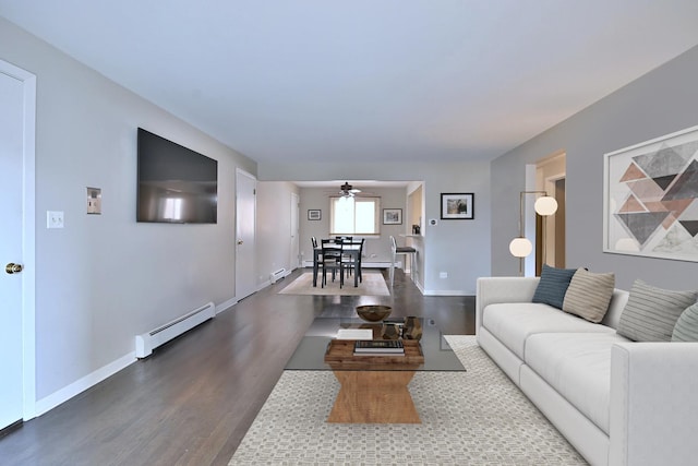 6869 N Overhill Ave Unit 2B, Chicago, IL 60631 - living room with a baseboard heating unit, wood finished floors, and ceiling fan