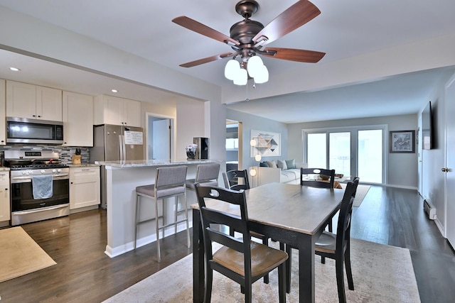 6869 N Overhill Ave Unit 2B, Chicago, IL 60631 - dining area featuring dark wood-style floors, a ceiling fan, and recessed lighting