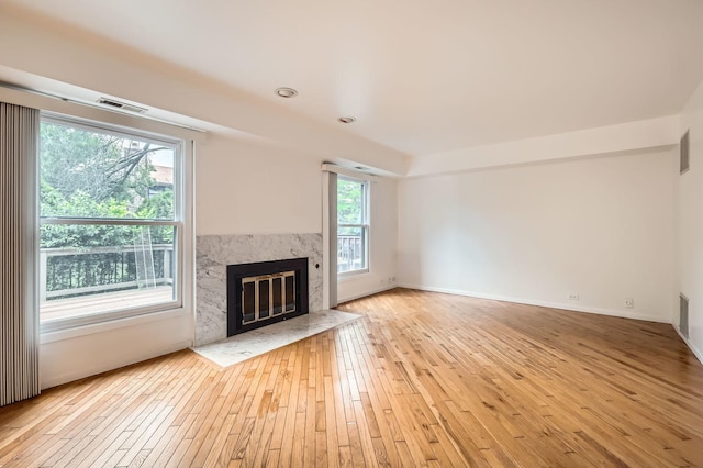 37 White Birch Ln, Westmont, IL 60559 - unfurnished living room featuring hardwood / wood-style floors and a high end fireplace