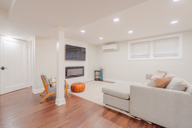 5901 N Navarre Ave, Chicago, IL 60631 - living room with an AC wall unit, wood finished floors, recessed lighting, and a large fireplace