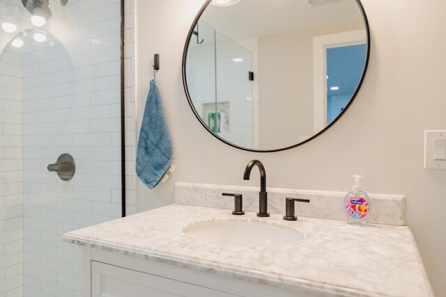 5901 N Navarre Ave, Chicago, IL 60631 - bathroom featuring vanity and a tile shower