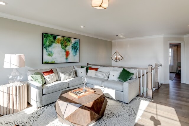 16642 S Sun Meadow Dr, Lockport, IL 60441 - living area featuring recessed lighting, ornamental molding, wood finished floors, and a chandelier