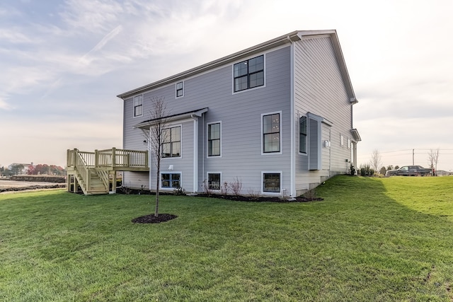 16642 S Sun Meadow Dr, Lockport, IL 60441 - rear view of house with a yard, a wooden deck, and stairs