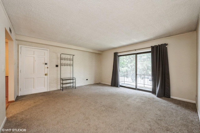 3325 Kirchoff Rd Unit 3E, Rolling Meadows, IL 60008 - spare room featuring a textured ceiling and carpet