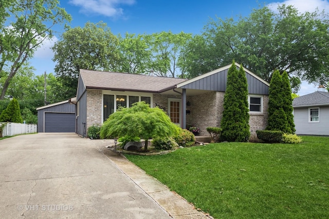 3006 Thrush Ln, Rolling Meadows, IL 60008 - view of front of house with brick siding, a garage, and an outbuilding