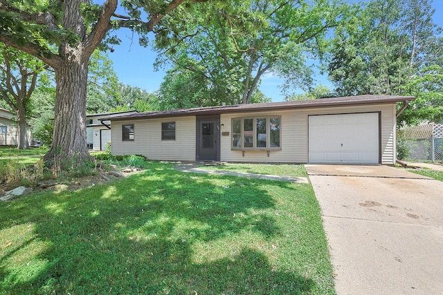 117 Timber Trl, Streamwood, IL 60107 - ranch-style house with concrete driveway, a front yard, and a garage