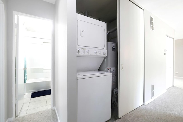117 Timber Trl, Streamwood, IL 60107 - washroom with stacked washer / drying machine and light colored carpet
