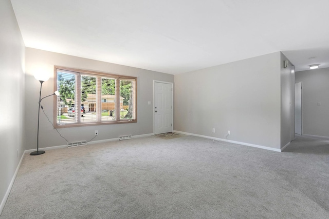 117 Timber Trl, Streamwood, IL 60107 - carpeted spare room featuring baseboards