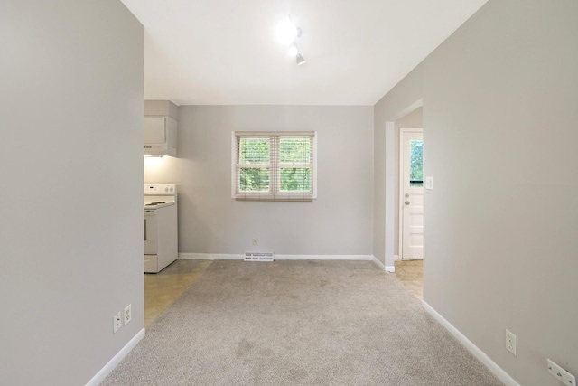117 Timber Trl, Streamwood, IL 60107 - unfurnished living room featuring light carpet