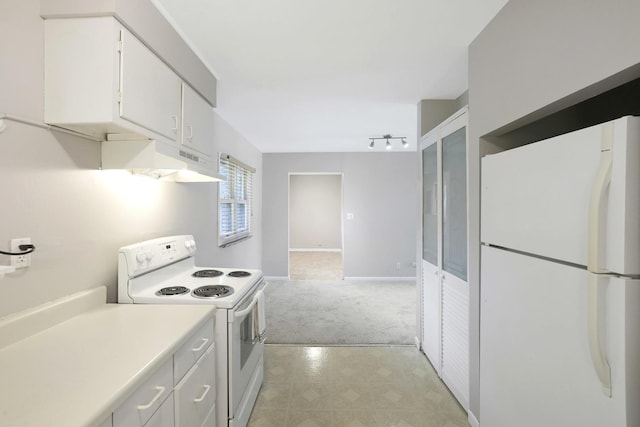 117 Timber Trl, Streamwood, IL 60107 - kitchen featuring white appliances, light colored carpet, light countertops, and white cabinets