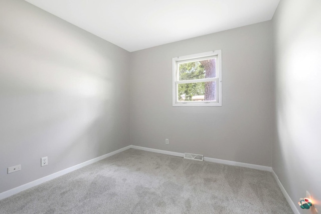 117 Timber Trl, Streamwood, IL 60107 - carpeted spare room featuring baseboards