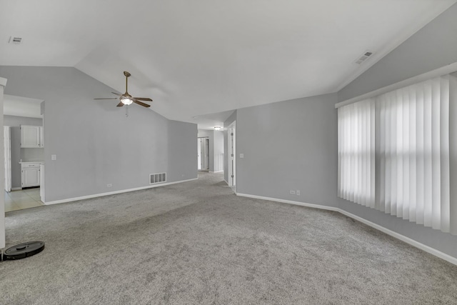 13 Willow Pkwy, Buffalo Grove, IL 60089 - unfurnished living room featuring vaulted ceiling, a ceiling fan, and light carpet