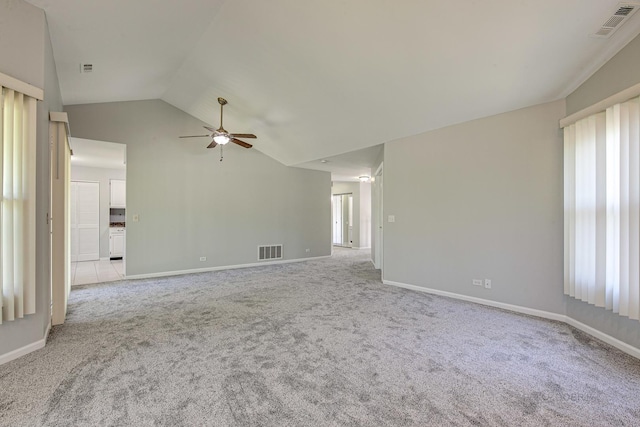 13 Willow Pkwy, Buffalo Grove, IL 60089 - spare room with a ceiling fan, light colored carpet, lofted ceiling, and healthy amount of natural light