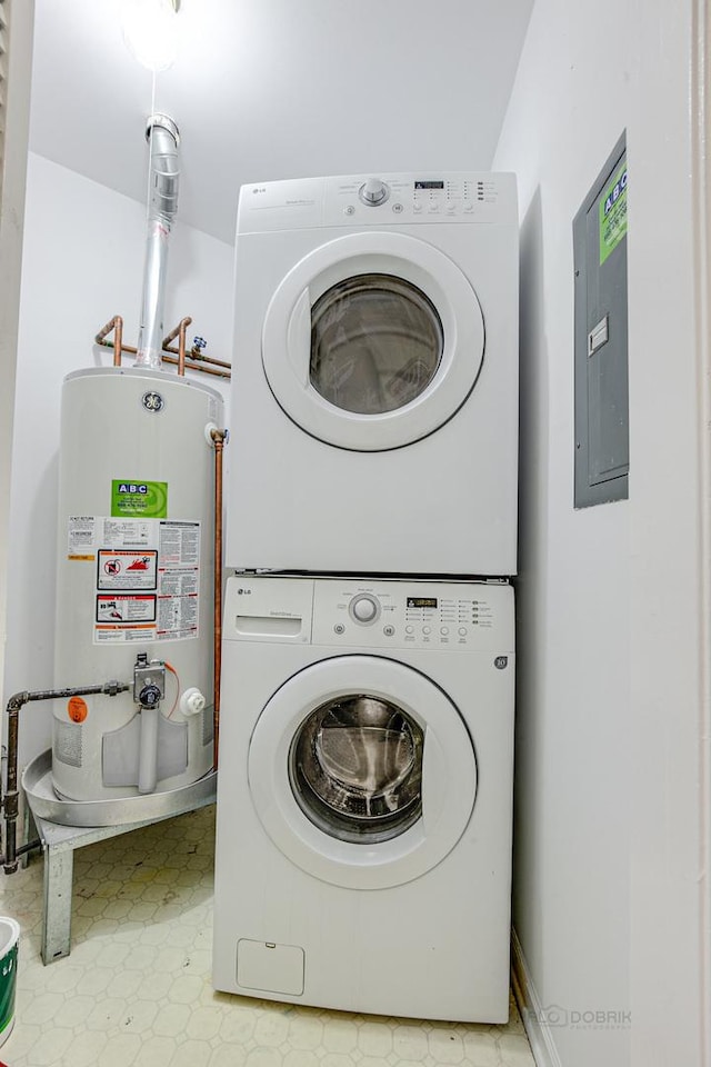 13 Willow Pkwy, Buffalo Grove, IL 60089 - washroom with stacked washing machine and dryer, water heater, electric panel, and tile patterned floors